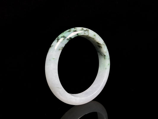 A misty green peaks jadeite bangle.