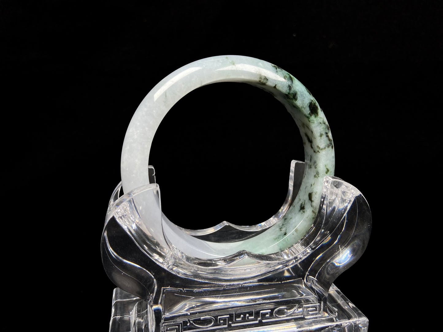 A misty green peaks jadeite bangle.
