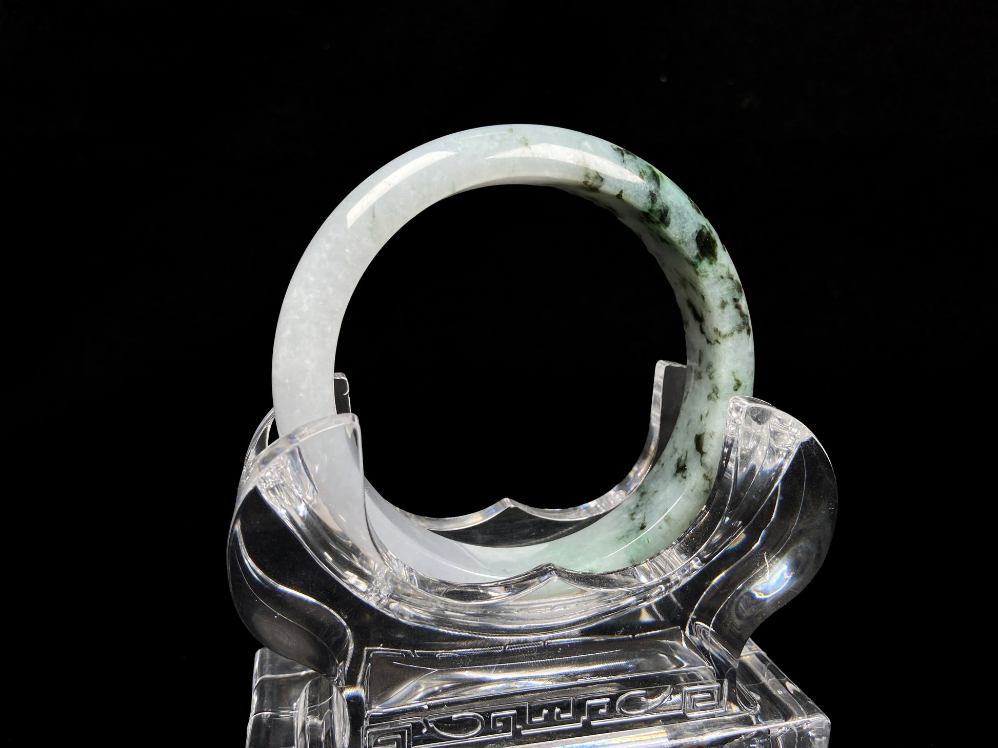A misty green peaks jadeite bangle.