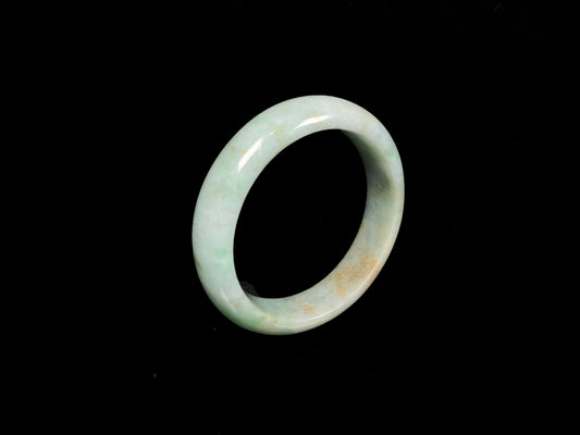 A moss honey jadeite bangle.
