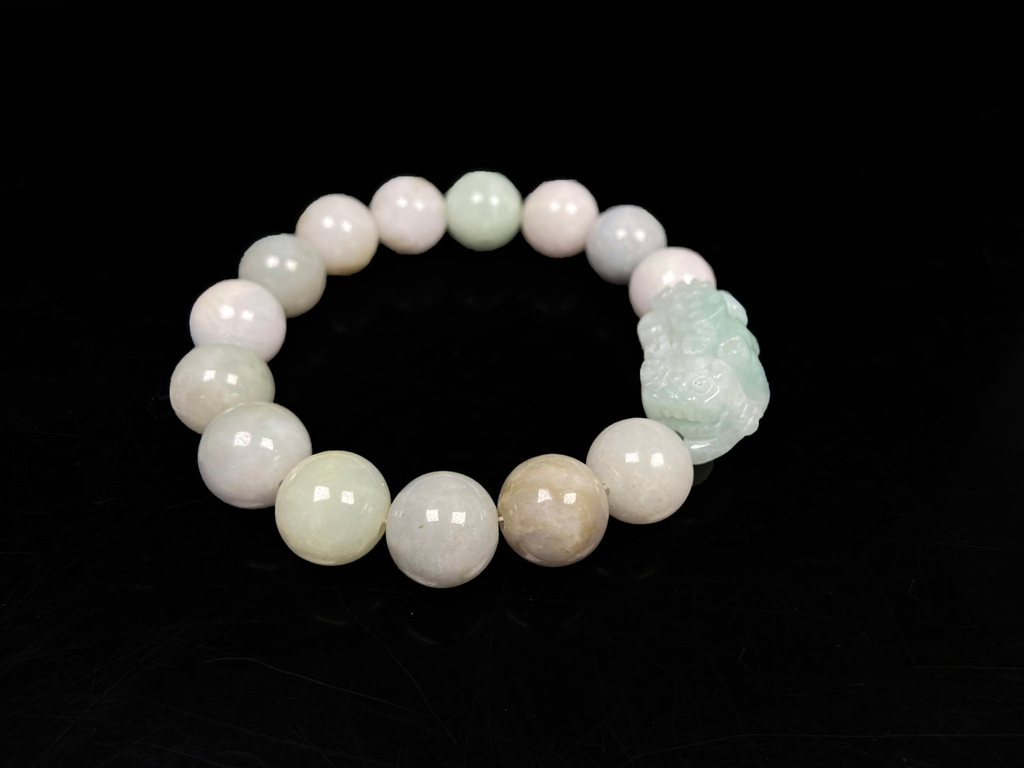 A light green fortune pixiu beaded bracelet.