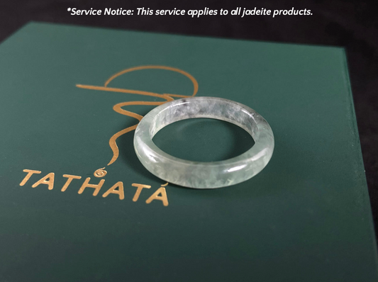Green jade ring on a Tathata branded box