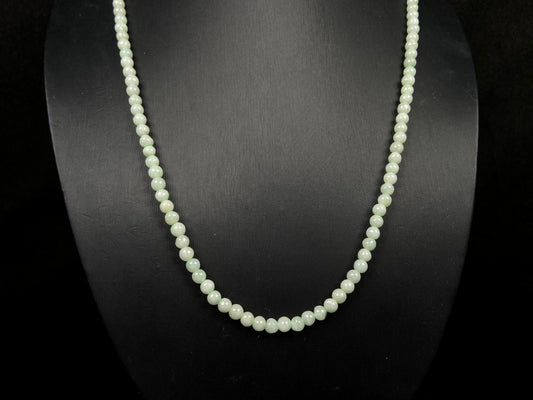 A soft milky green jadeite beads necklace.