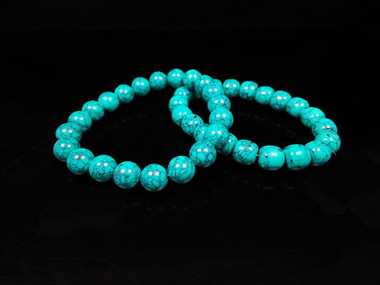 A vivid blue web Magnesite beaded bracelet.