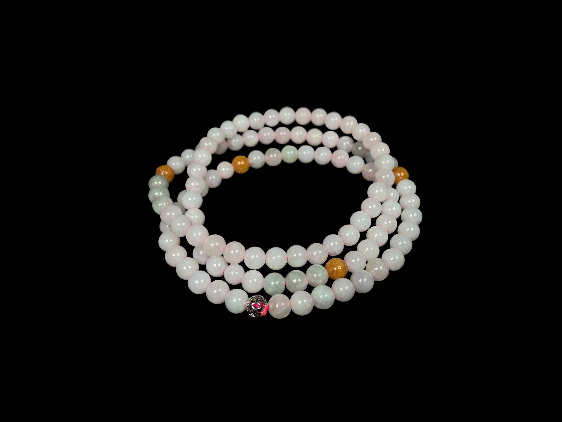 A honey and milky white harmony jadeite beads necklace.