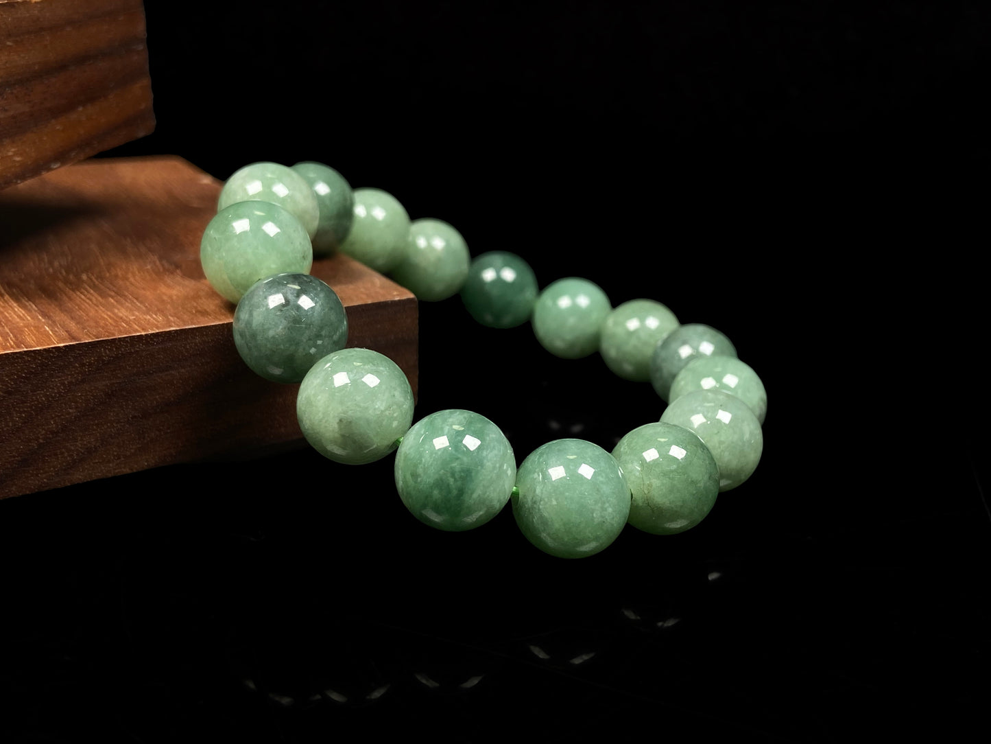 A verdant misty green jadeite beads bracelet.