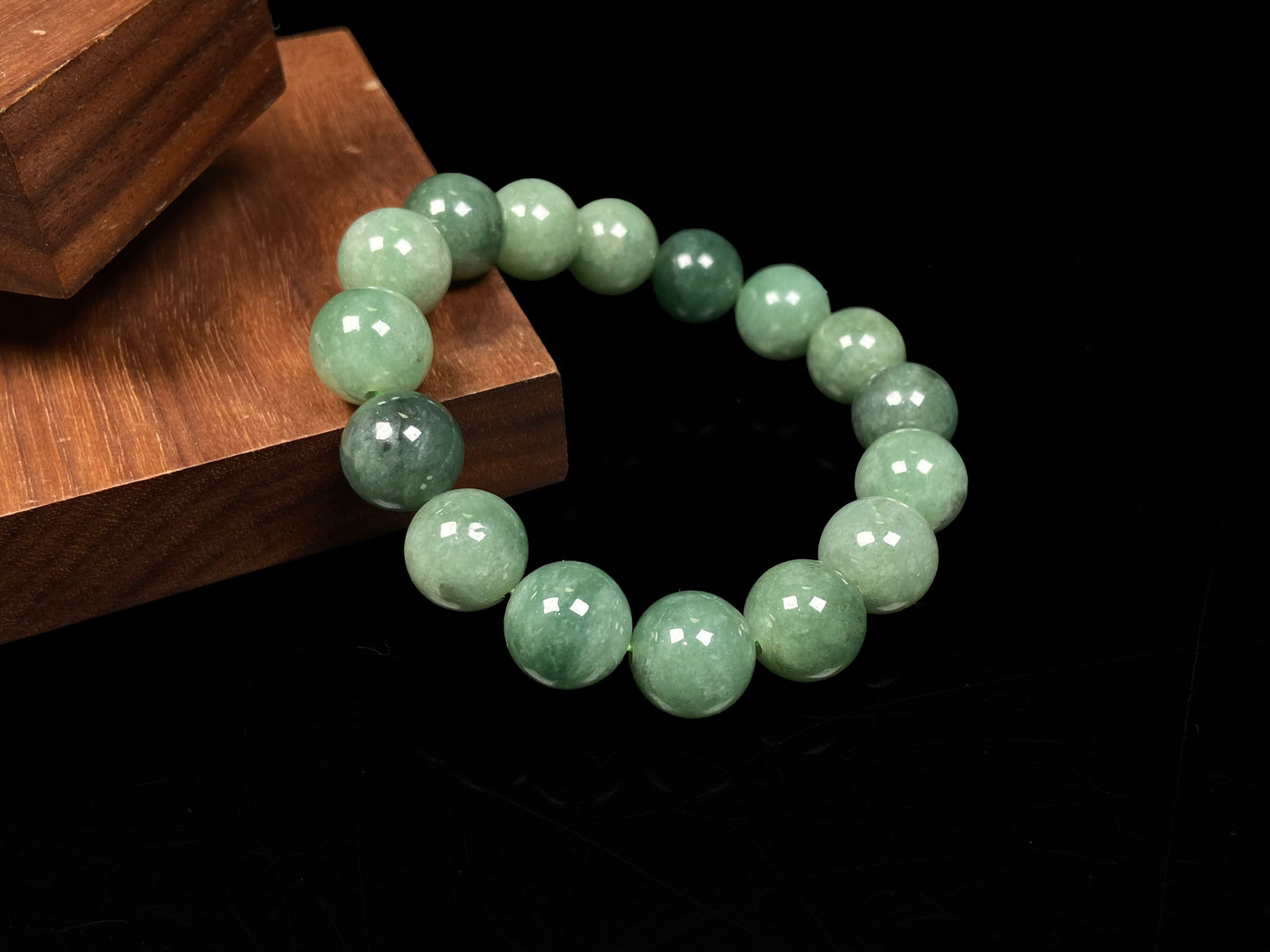 A verdant misty green jadeite beads bracelet.