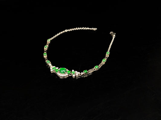 A glacial green dewy jadeite bracelet.