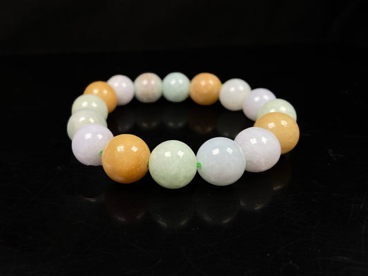 A tri-color green yellow purple jadeite beads bracelet.