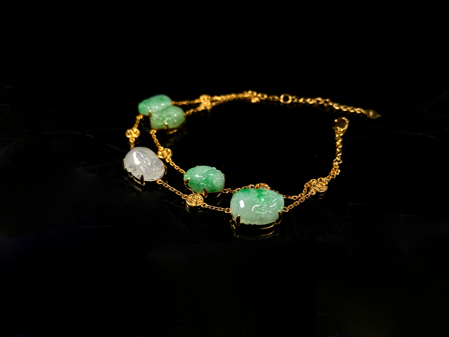 This bracelet is made with white Pixiu and green jadeite Pixiu.