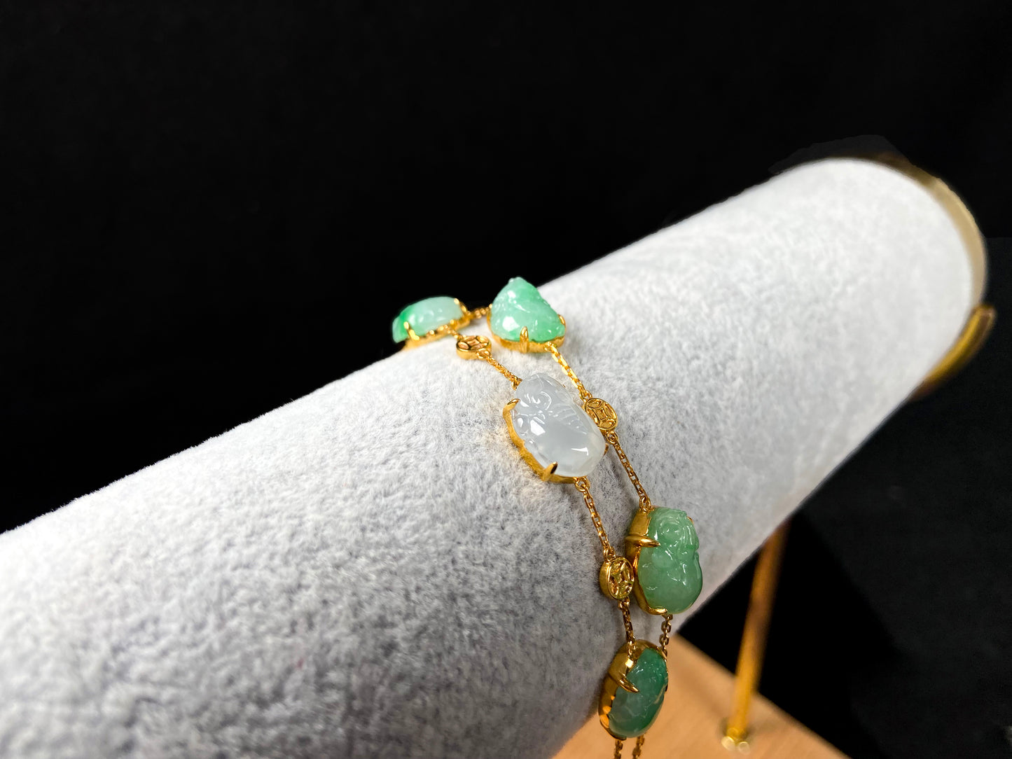 This bracelet is made with white Pixiu and green jadeite Pixiu.