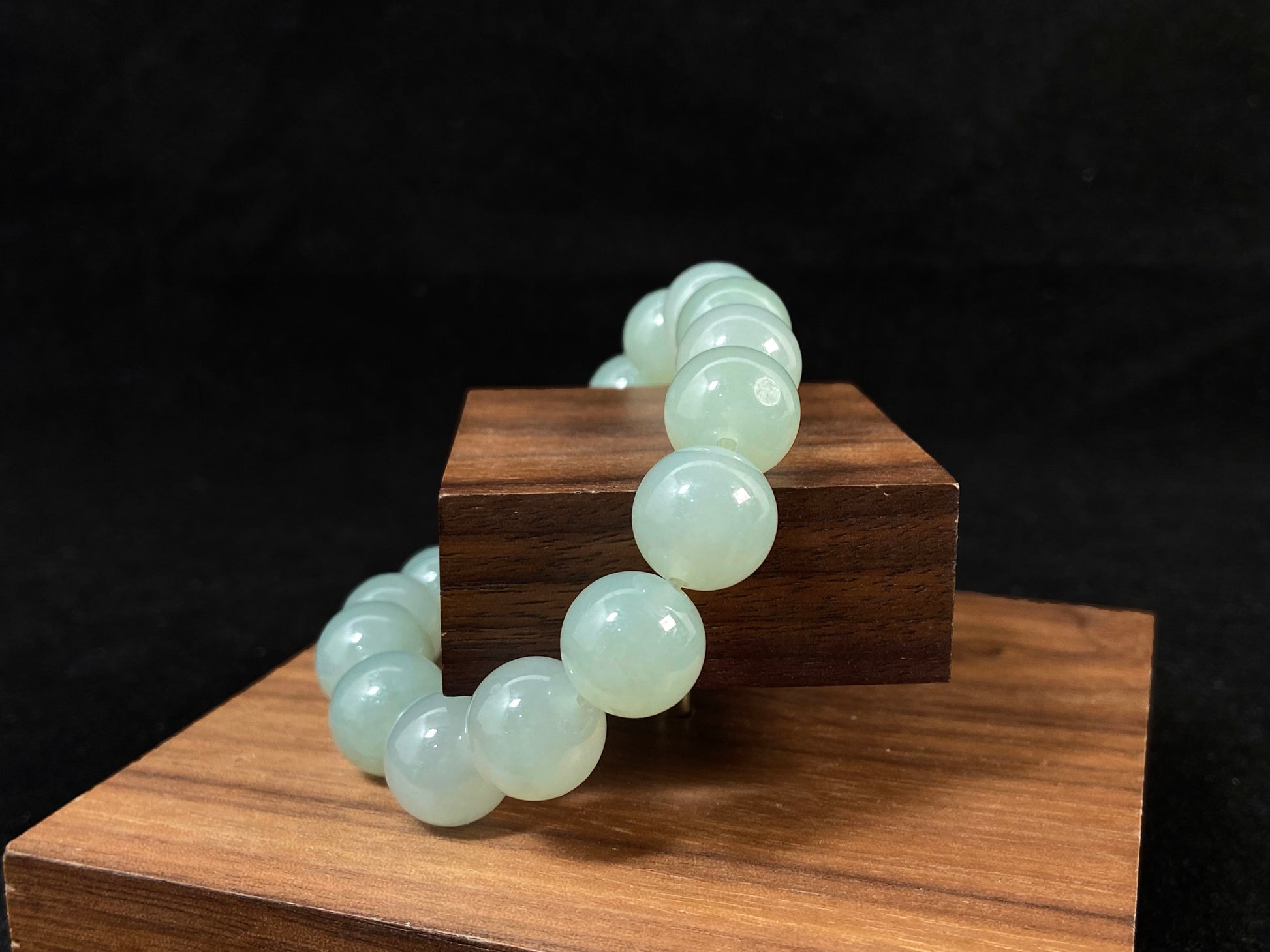 Transparent pale white green jade beads.
