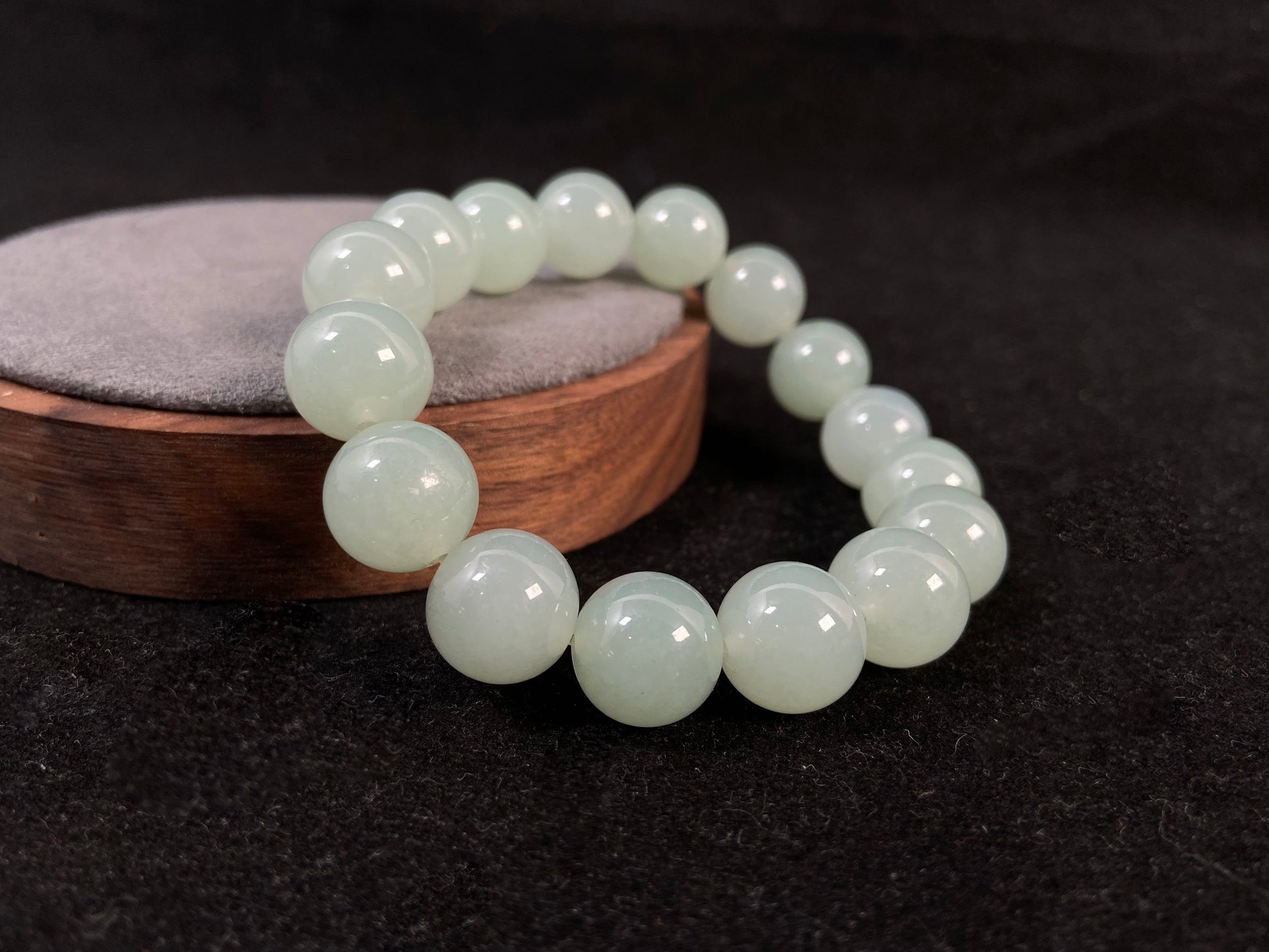 Transparent pale white green jade beads.