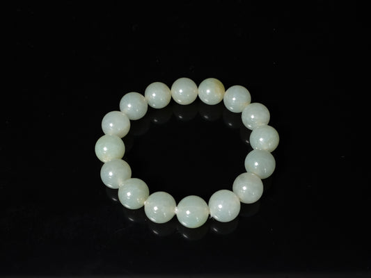 A warm icy green jadeite beads bracelet.