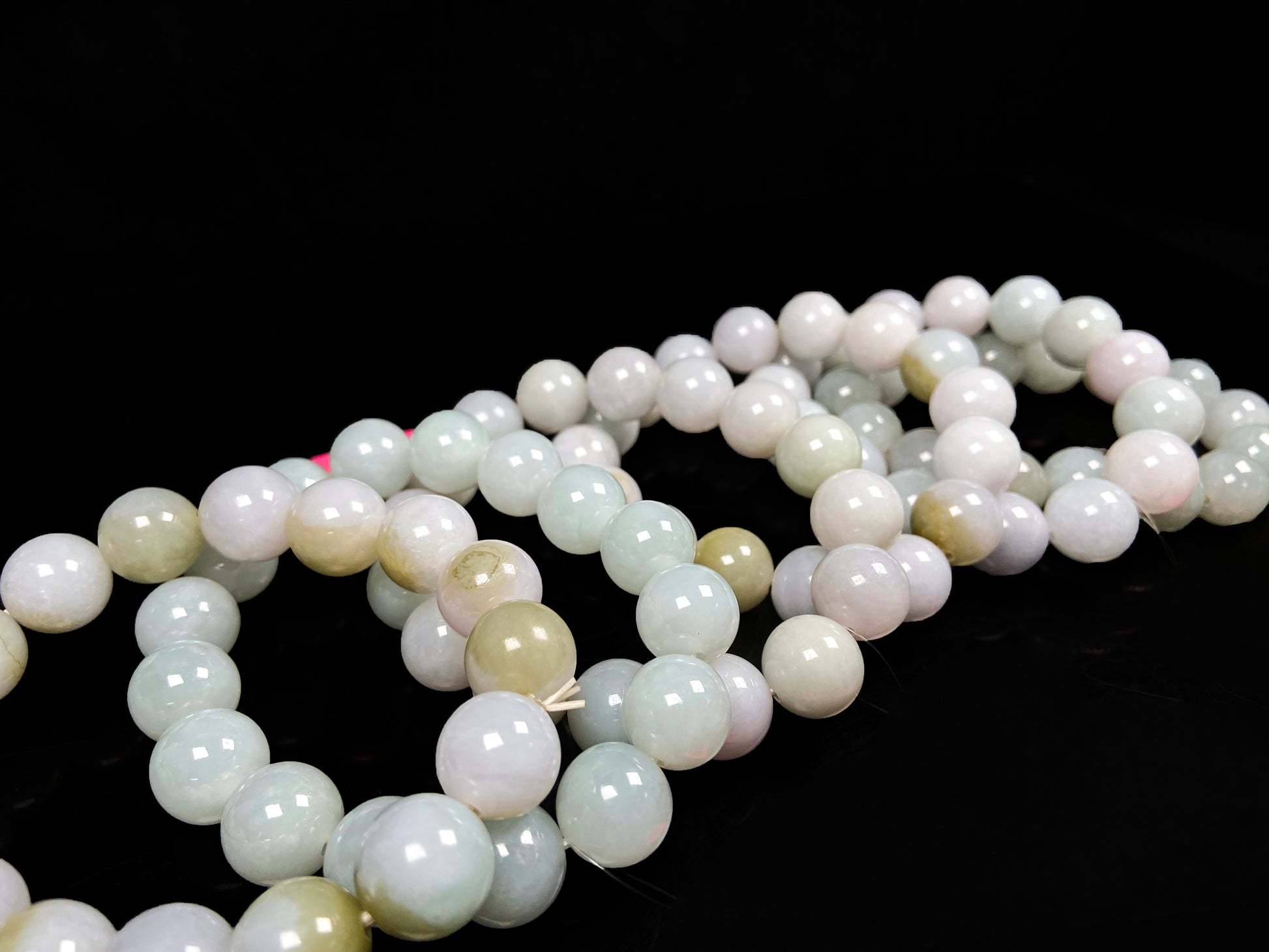 A creamy white soft green mix jadeite beads bracelet group.