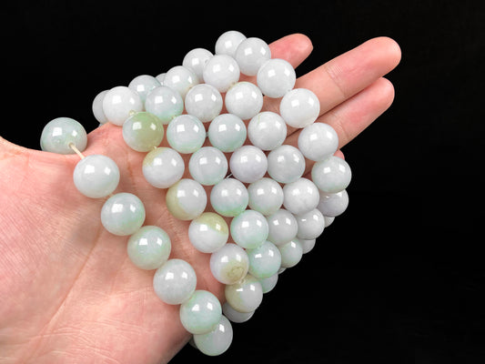 A creamy white soft green mix jadeite beads bracelet group.