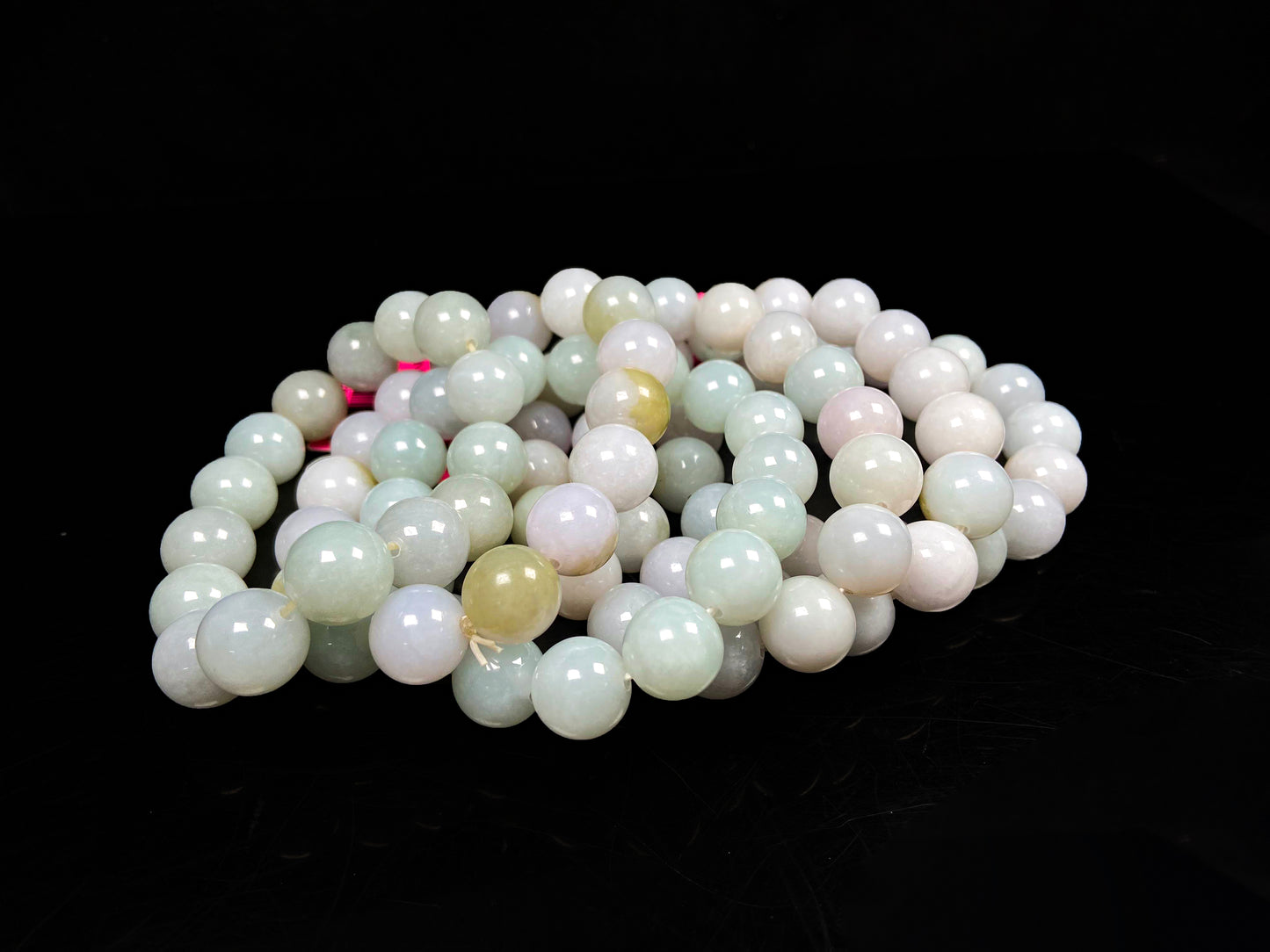 A creamy white soft green mix jadeite beads bracelet group.