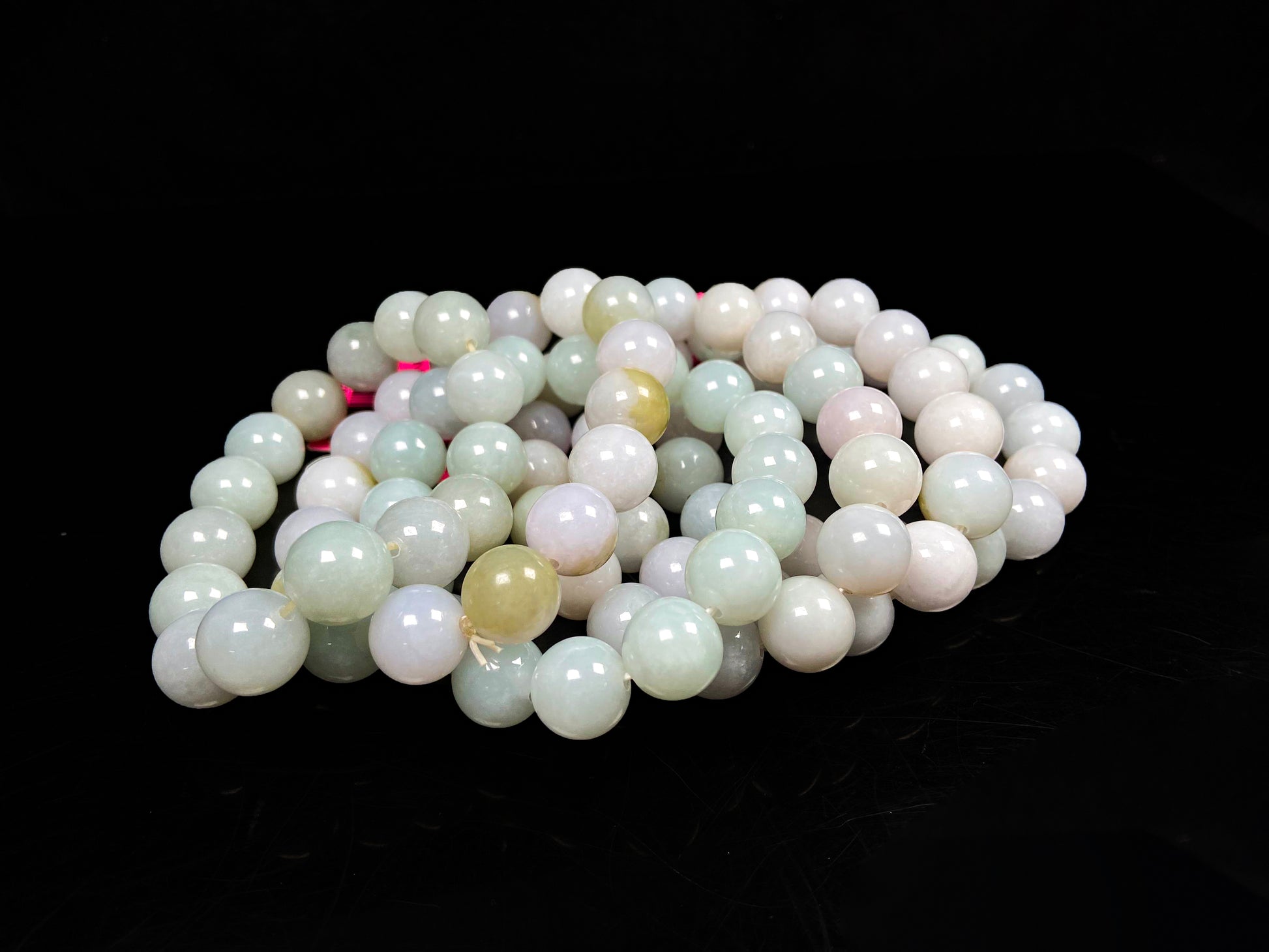 A creamy white soft green mix jadeite beads bracelet group.
