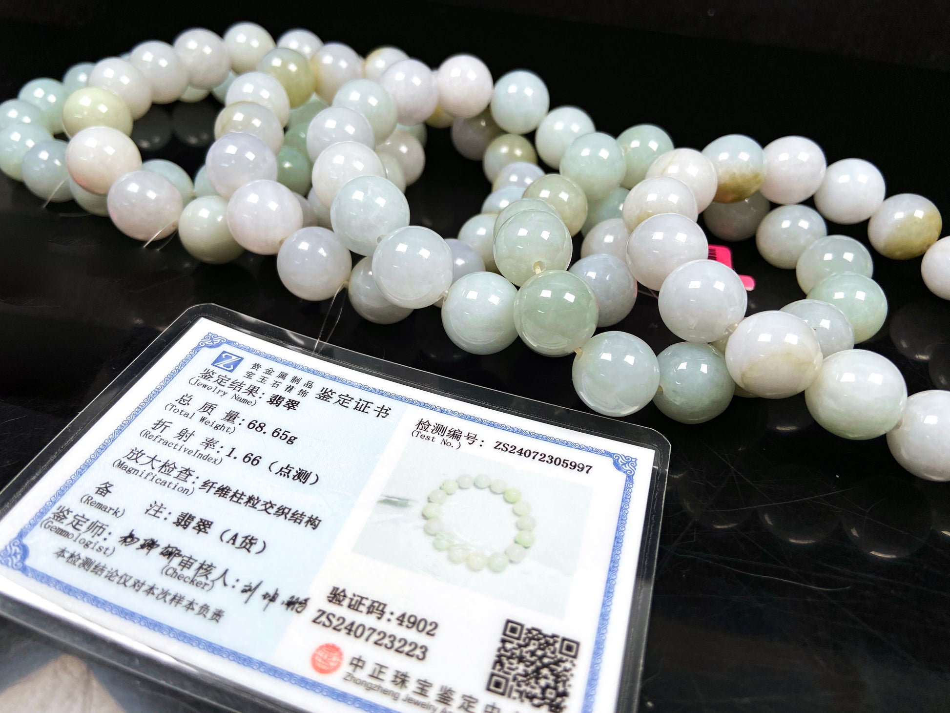 A creamy white soft green mix jadeite beads bracelet group.