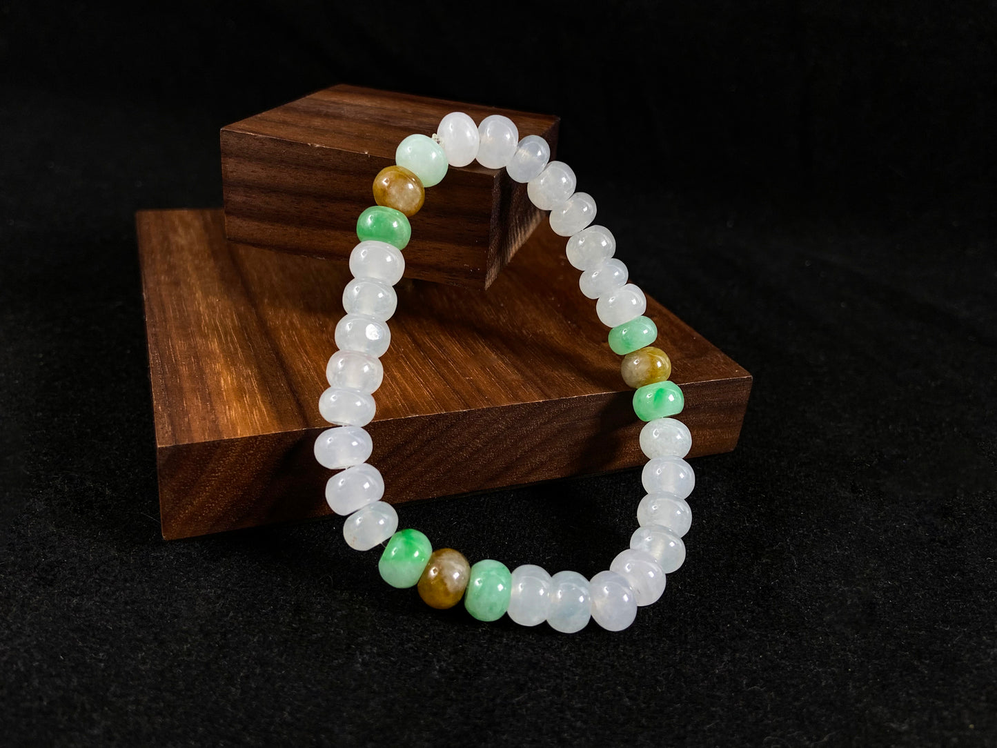 Crystalline beads with verdant and caramel hues.