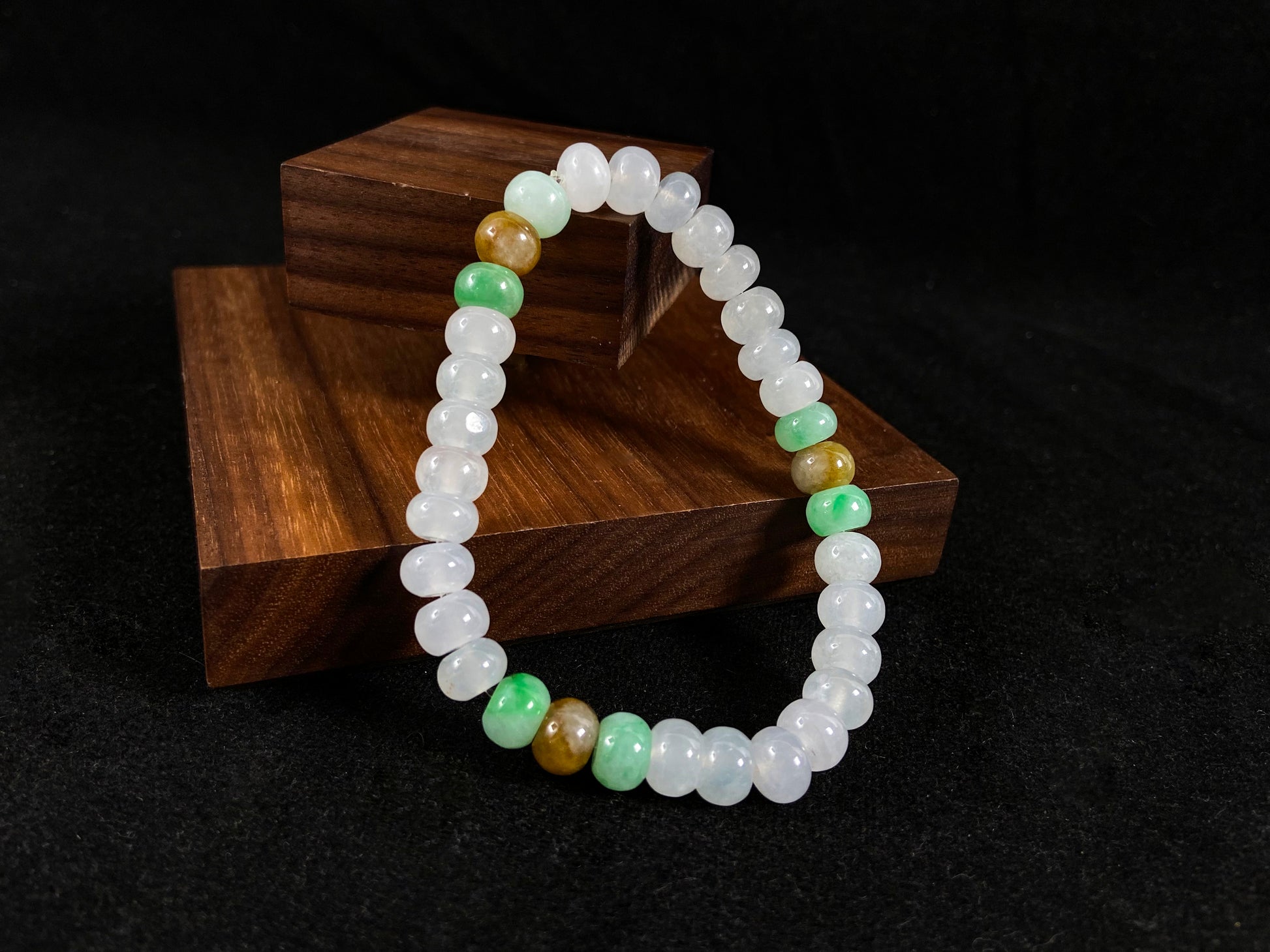 Crystalline beads with verdant and caramel hues.