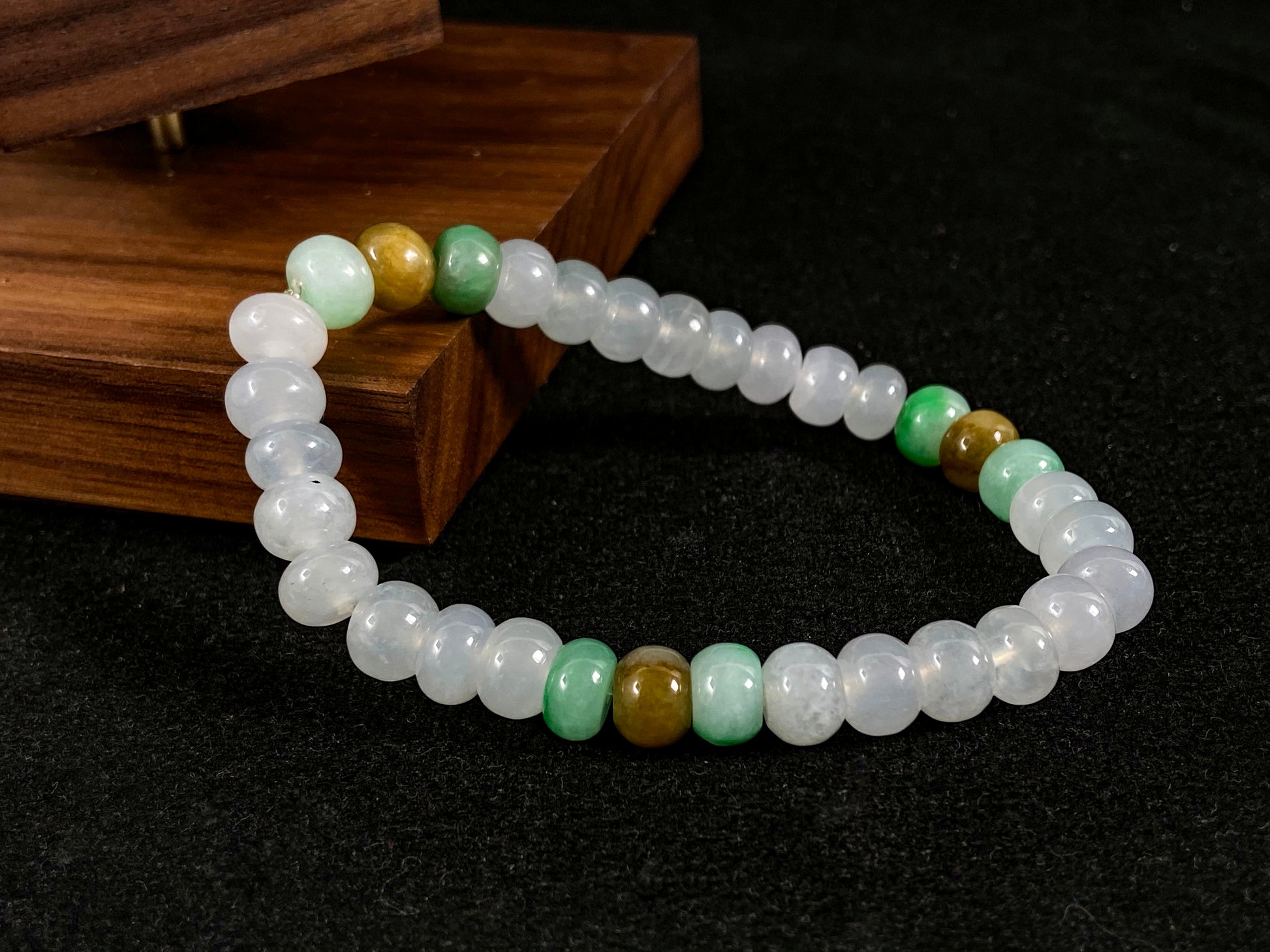 Crystalline beads with verdant and caramel hues.