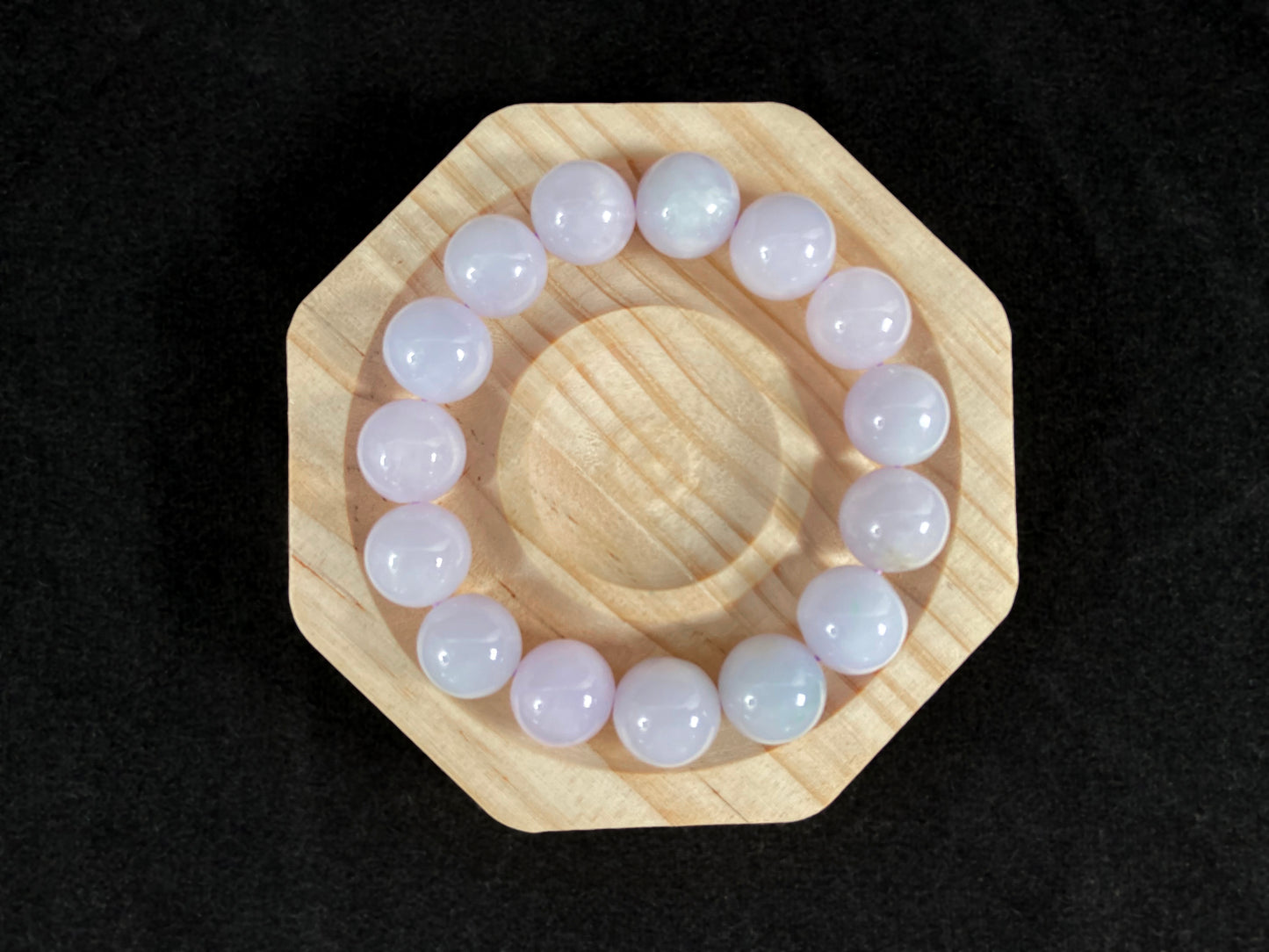 A jade bead strand composed entirely of creamy white beads.