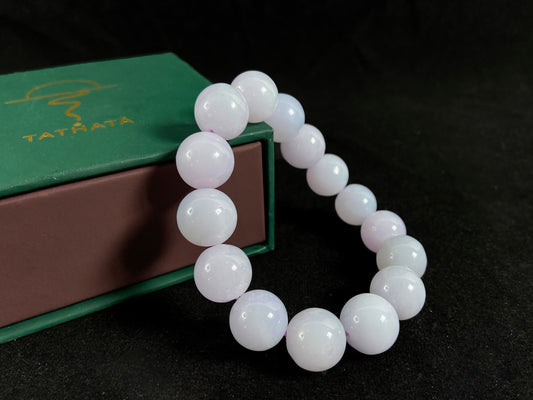 A jade bead strand composed entirely of creamy white beads.