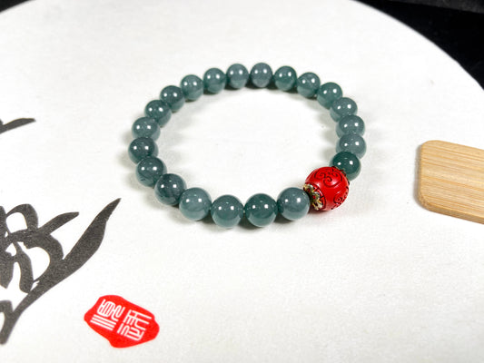 A misty teal calm jadeite beads bracelet.