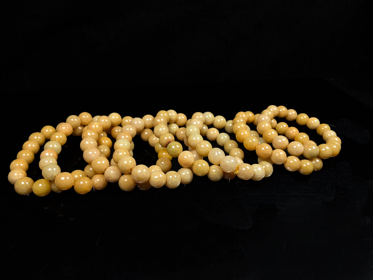 A warm honey gold beads bracelet group.