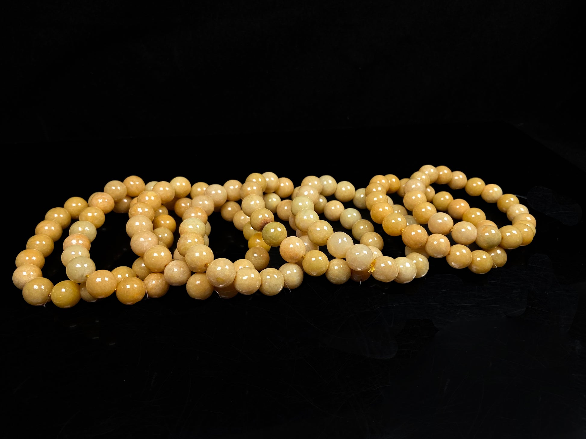 A warm honey gold beads bracelet group.