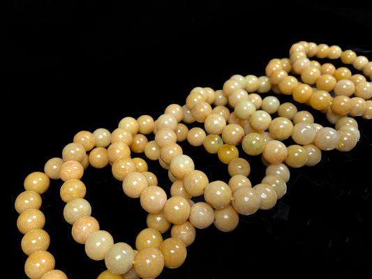 A warm honey gold beads bracelet group.
