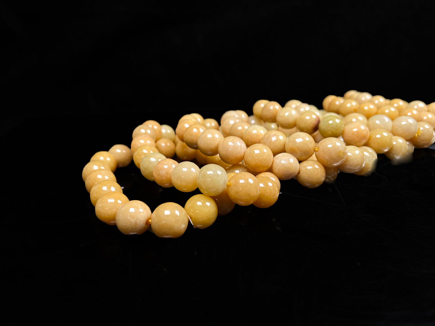 A warm honey gold beads bracelet group.