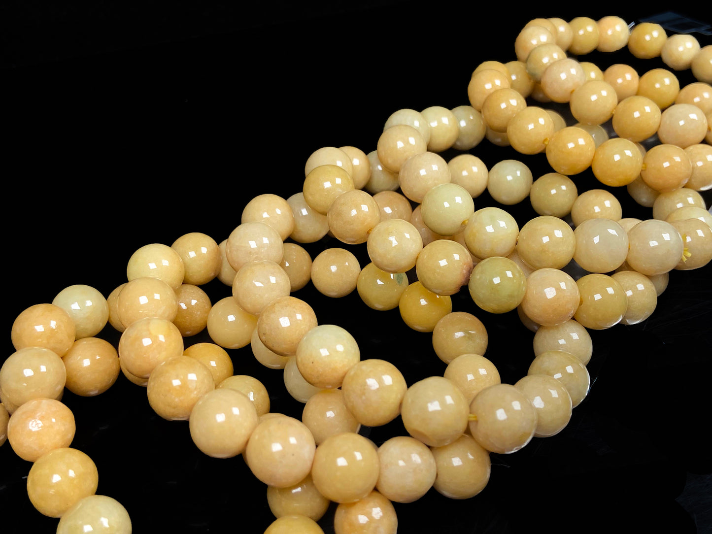 A warm honey gold beads bracelet group.
