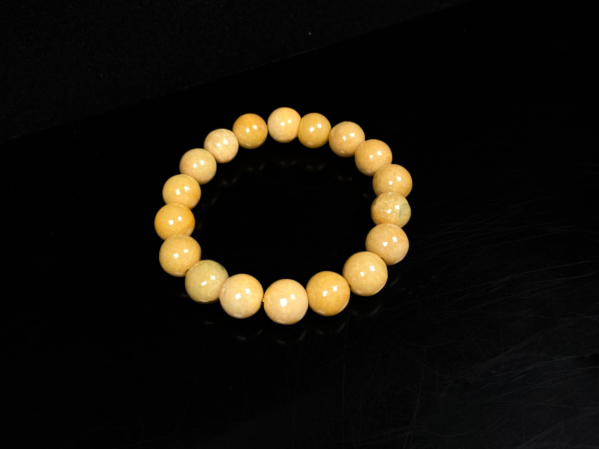 A warm honey gold beads bracelet.