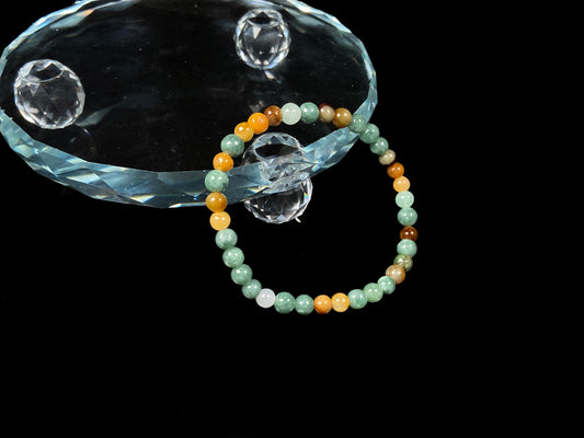 A dreamy green honey mix jadeite beads bracelet.