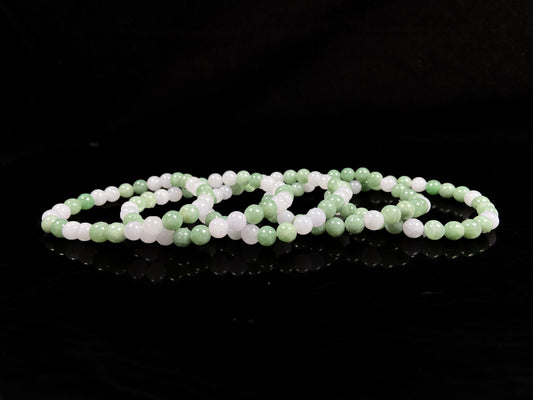 A verdant white peace jadeite beads bracelet group.