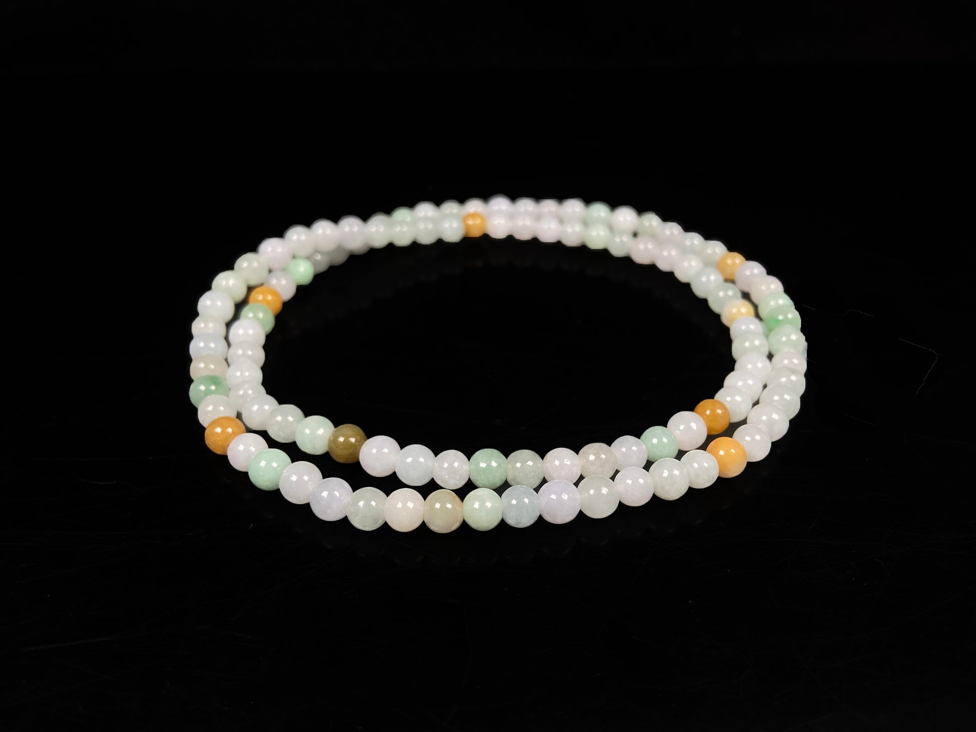 A gentle tri-color harmony jadeite beads bracelet & necklace.