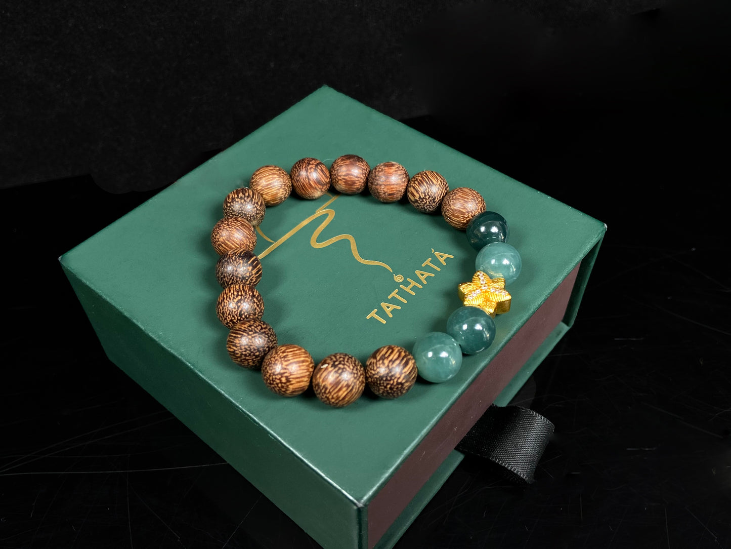 A golden star’s fortune blue bead jadeite brown agarwood bracelet.