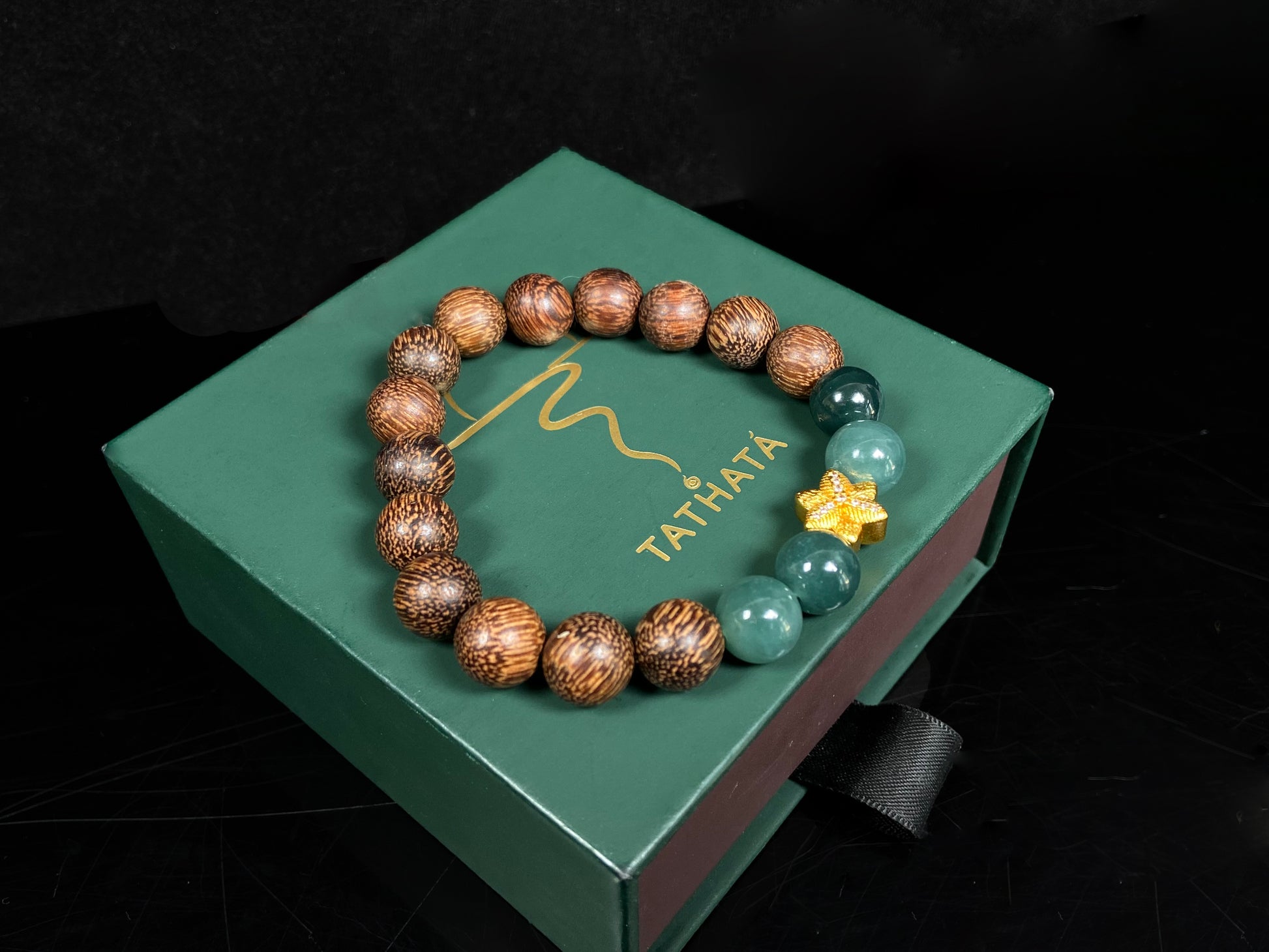 A golden star’s fortune blue bead jadeite brown agarwood bracelet.