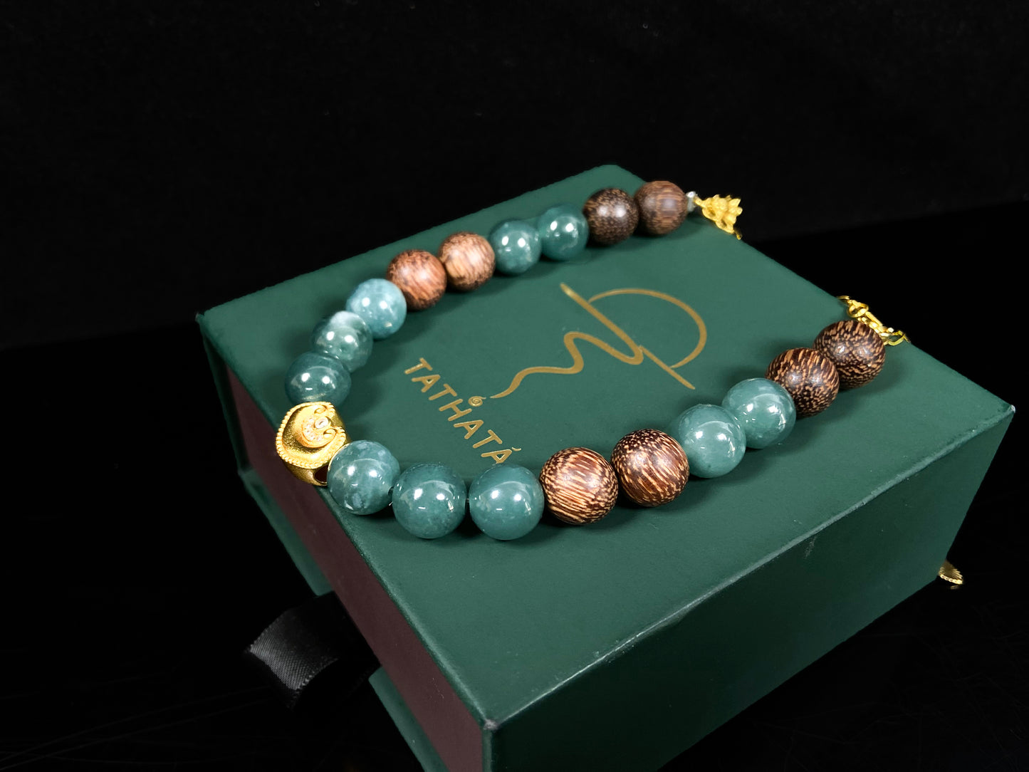 A auspicious golden Ruyi blue bead jadeite brown bead agarwood bracelet.
