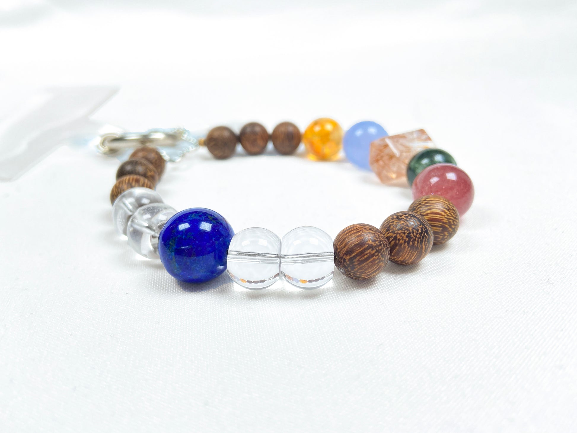Multicolored beaded bracelet on a white background