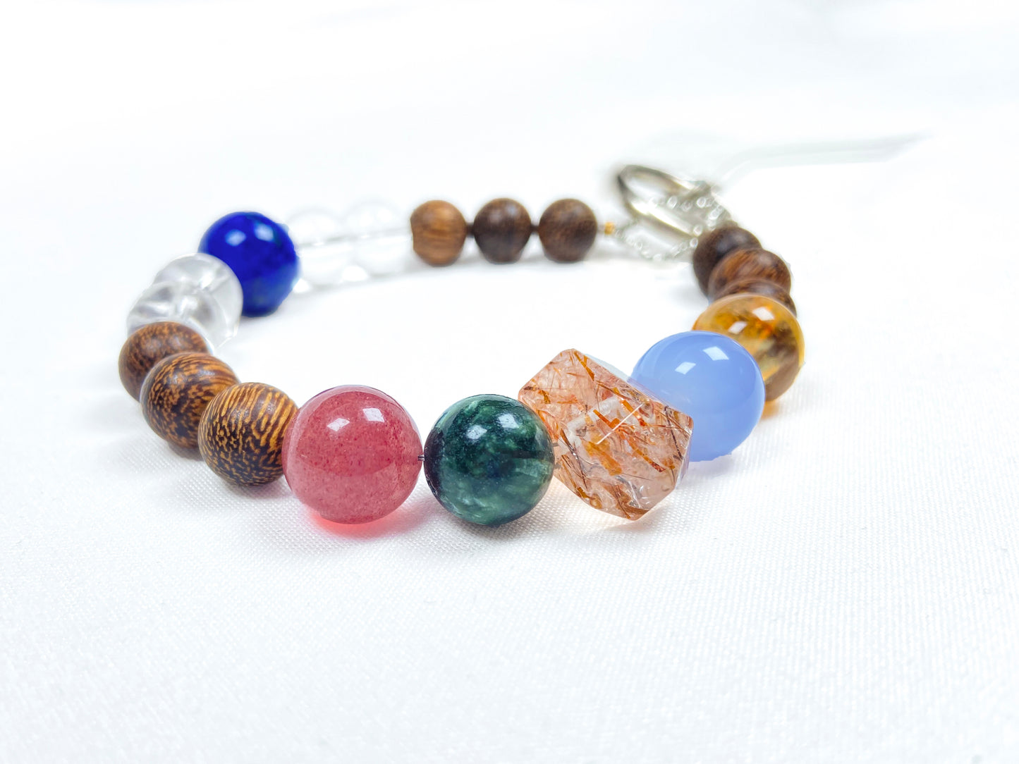 Multicolored beaded bracelet on a white background