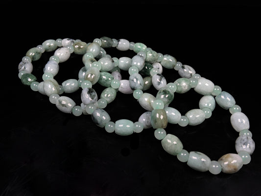A group of tri-color green white gray barrel & round beads jadeite beads bracelet.