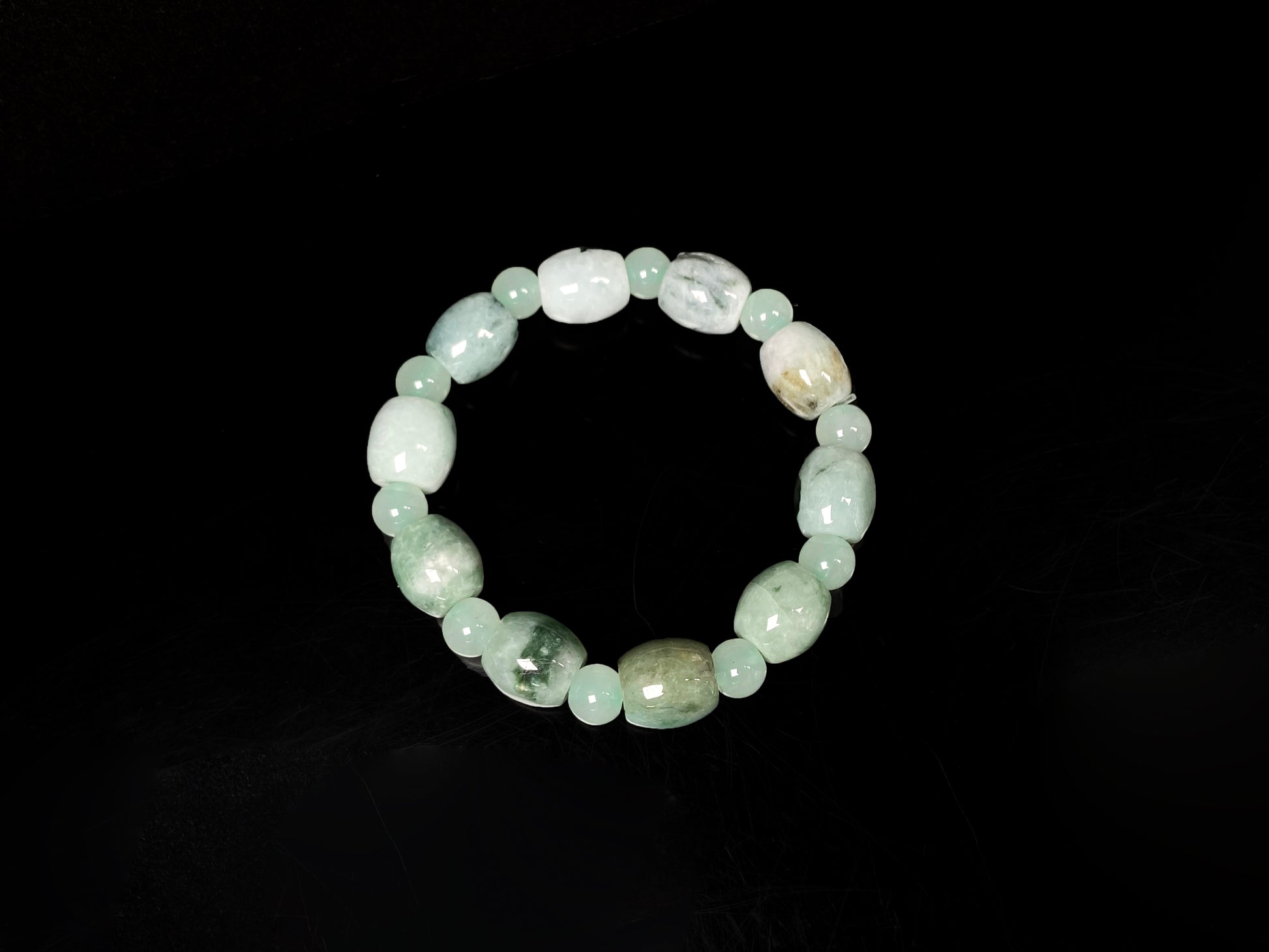 A tri-color green white gray barrel & round beads jadeite beads bracelet.