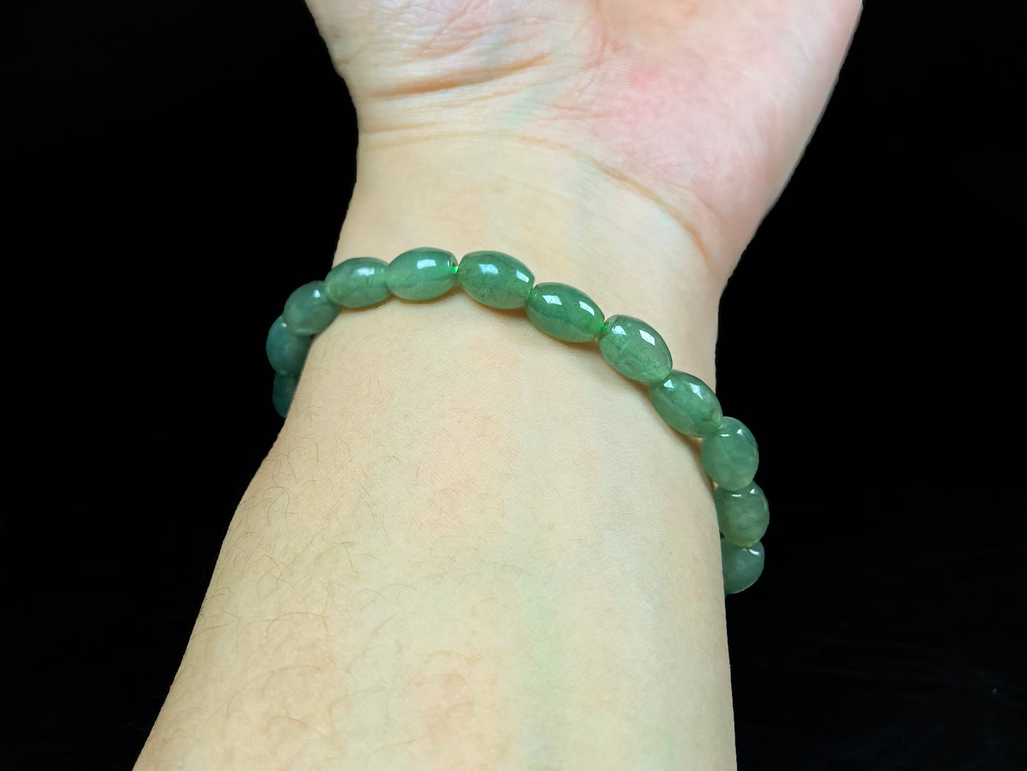 A green shadow luminance jadeite beads bracelet.