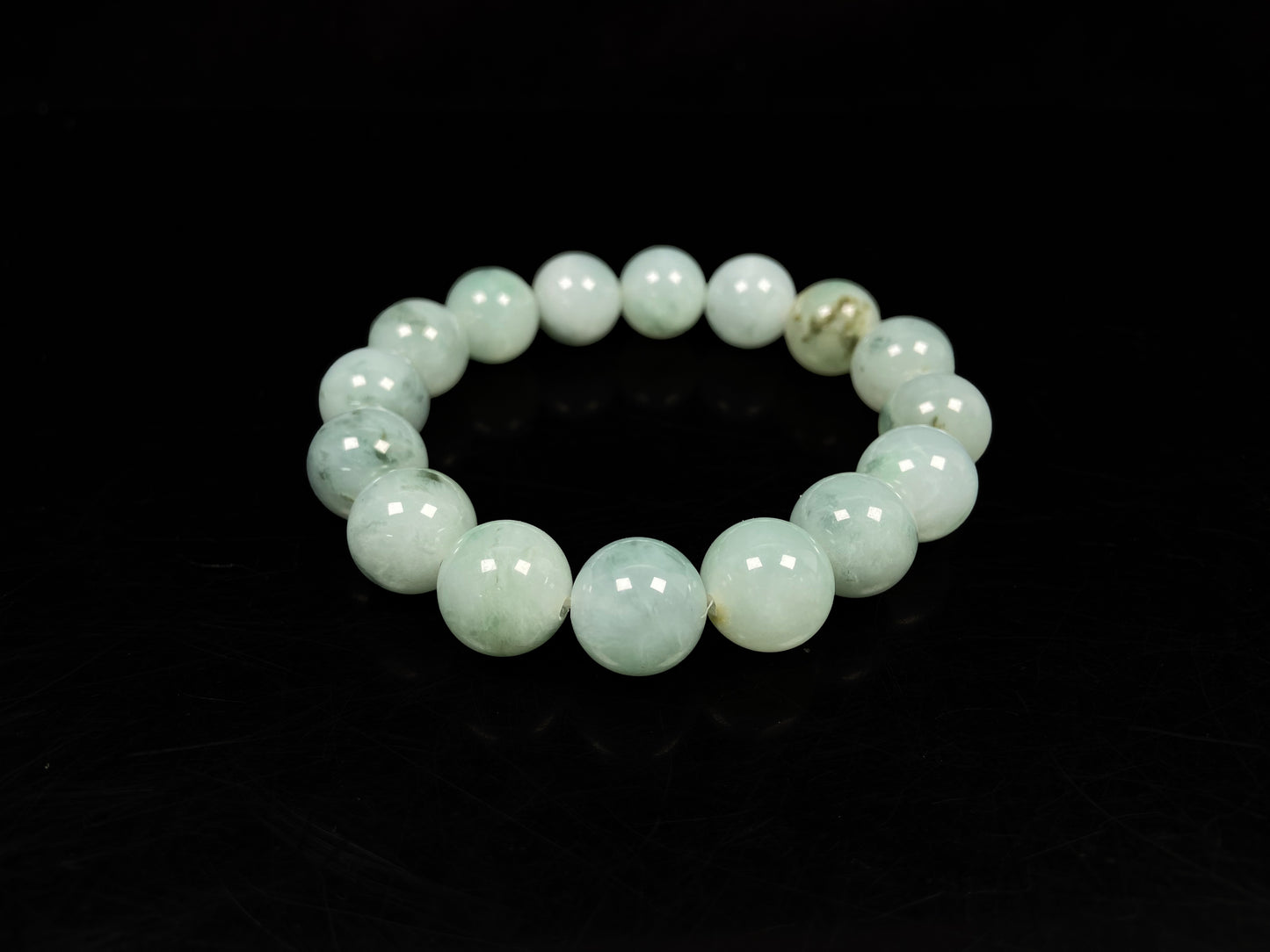 A light green mist beads bracelet.