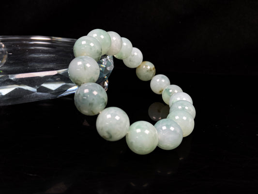 A light green mist beads bracelet.