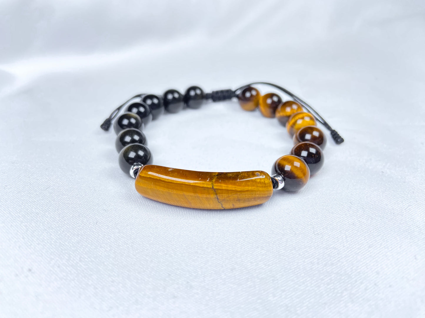 A black and gold contrast natural tiger's eye beaded bracelet.