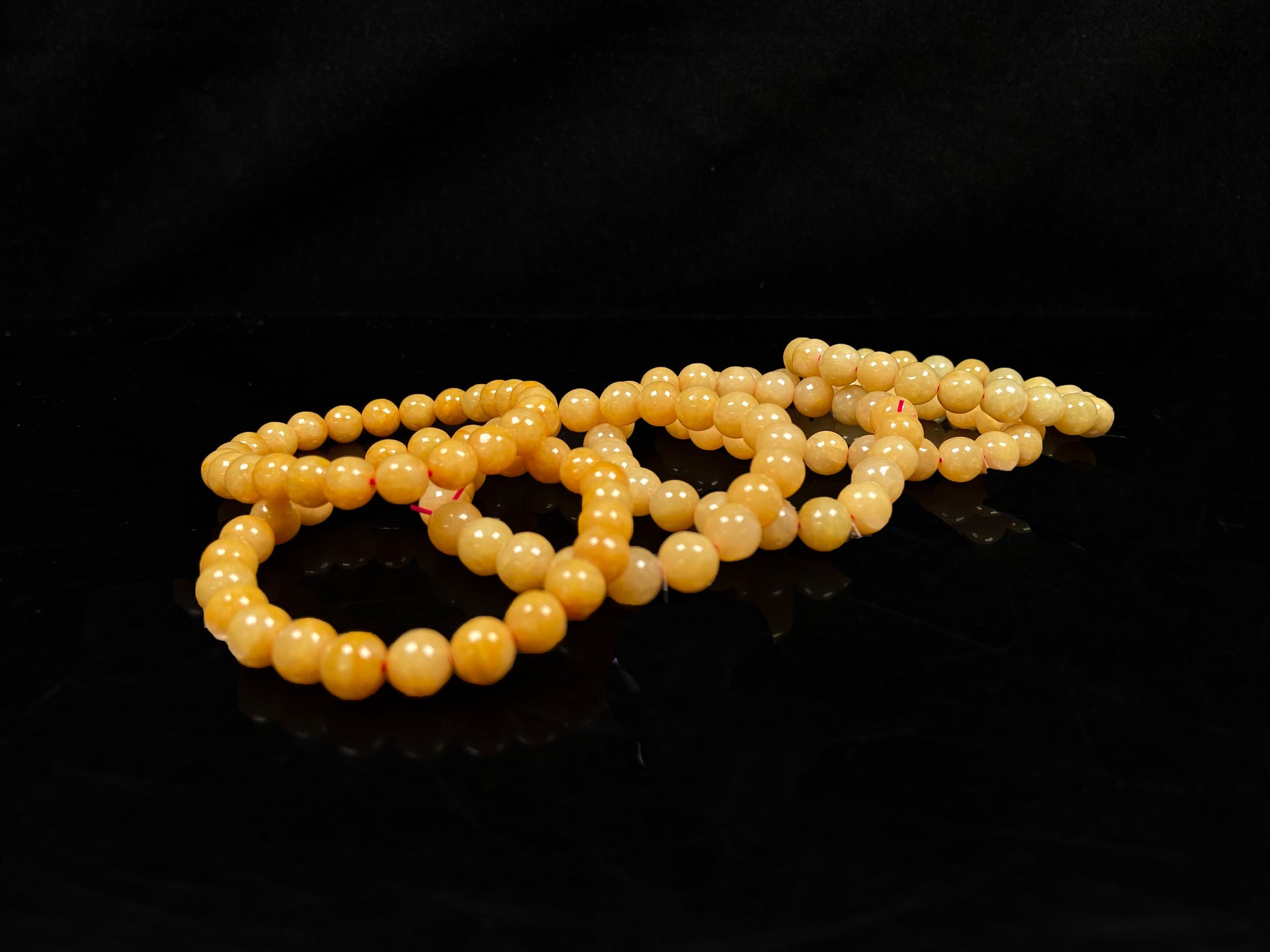 A group of calm corn yellow jadeite beads bracelet.